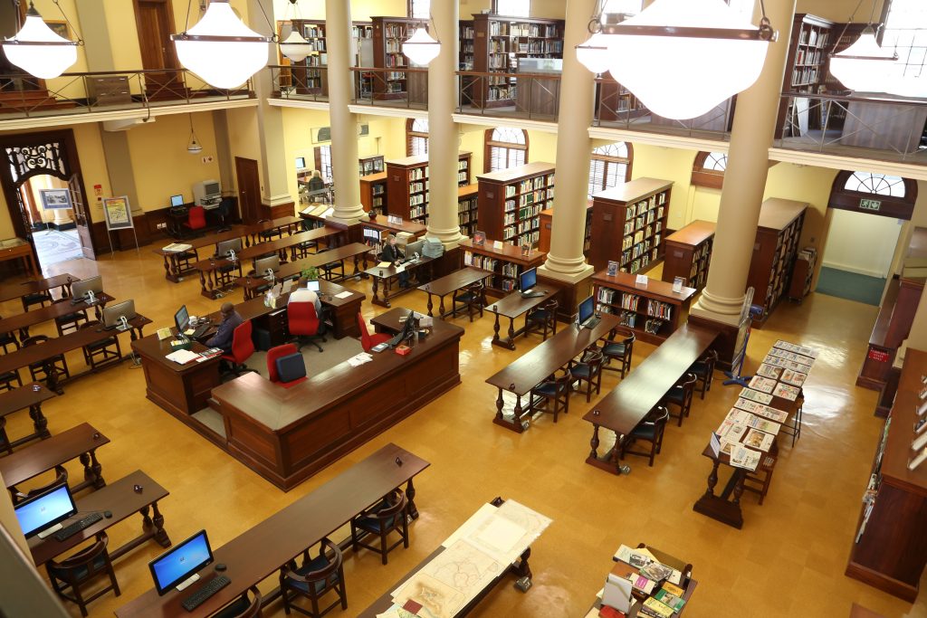 The restoredReading Room of the JW Jagger Building showing desks, shelves, computers, etc.