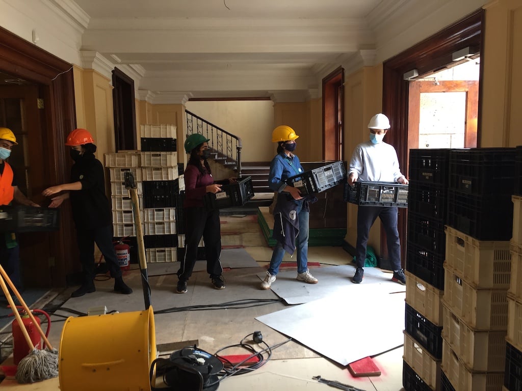 Staff and volunteers removing material from the Jagger Store.