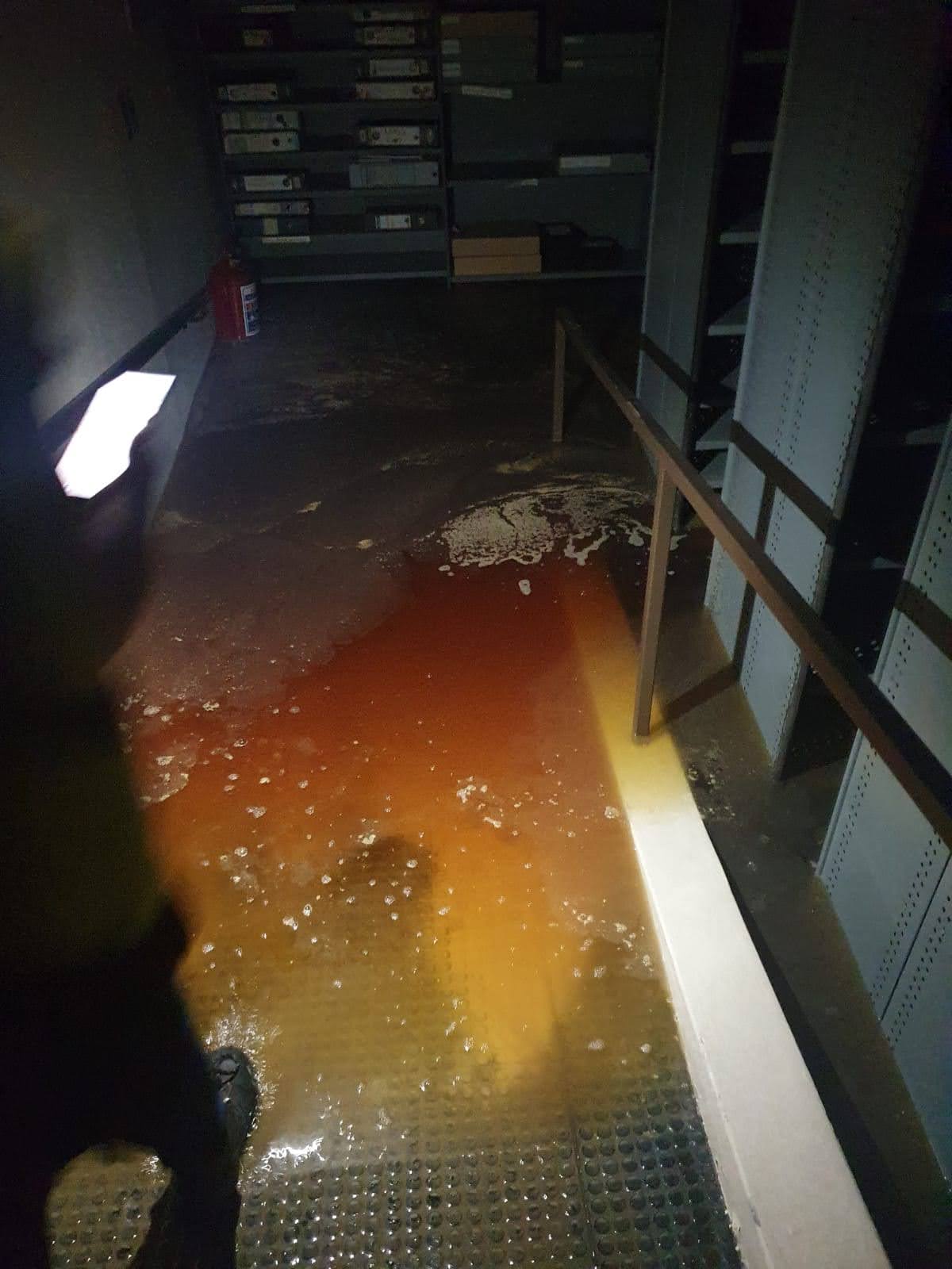 Waist high water in the basement after the fire was extinguished.